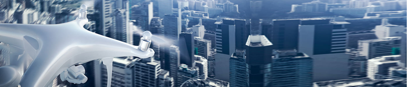 Technology today with drone over big city. Gifts from all types of technology ideas for every occassion.