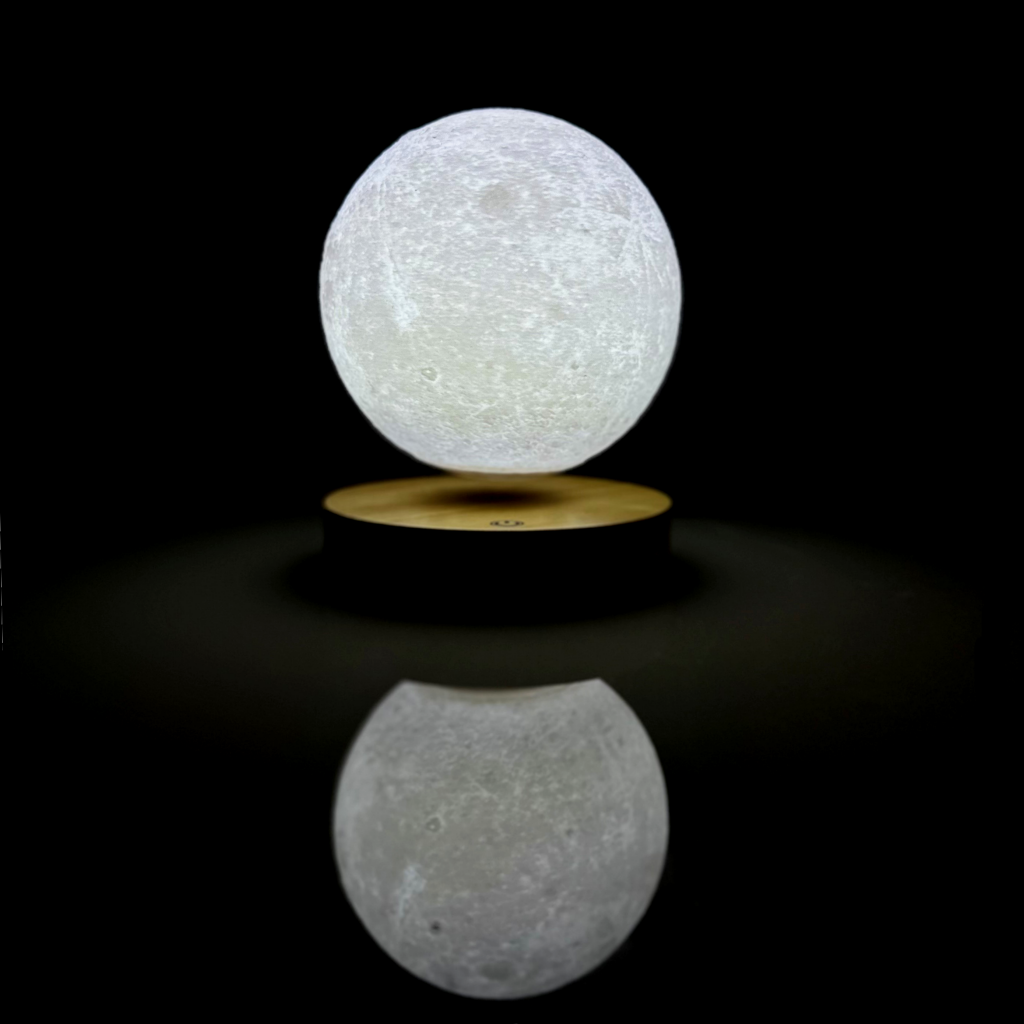 Levitating Moon Lamp floating above a wooden base with a glowing 3D moon design, perfect for home decor or as a unique desk lamp gift.