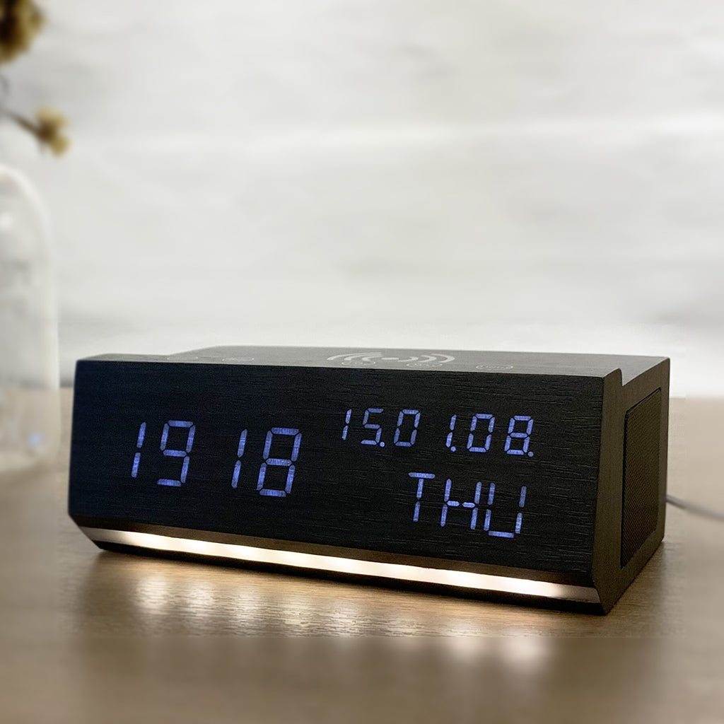 Shop Wireless Charging Wood Alarm Clock with LED display showing time, date, and day. Features wireless phone charging and modern wood design.
