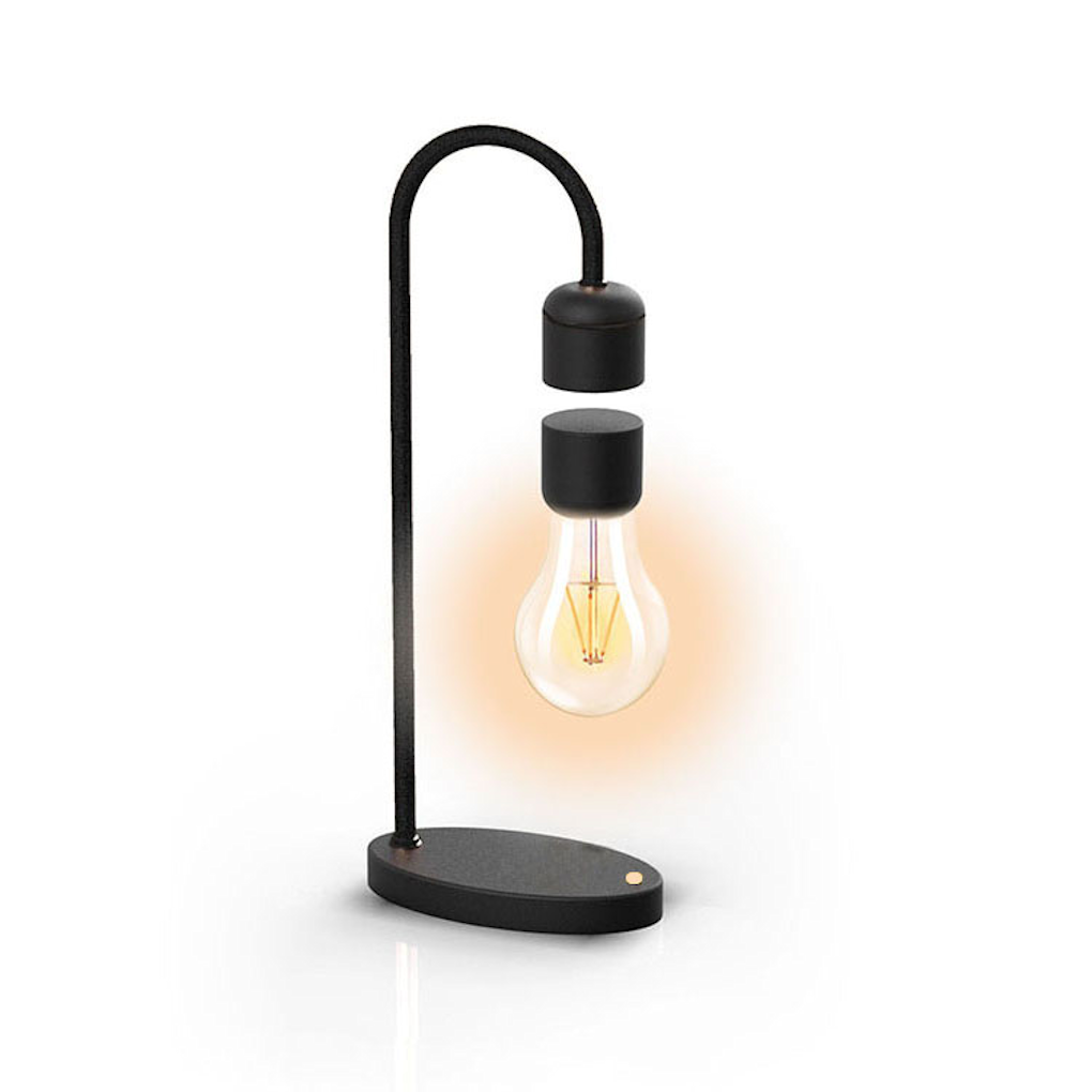 Buy Levitating Light Bulb Gift with warm glow and sleek black base, perfect for modern home decor or unique housewarming gift ideas.