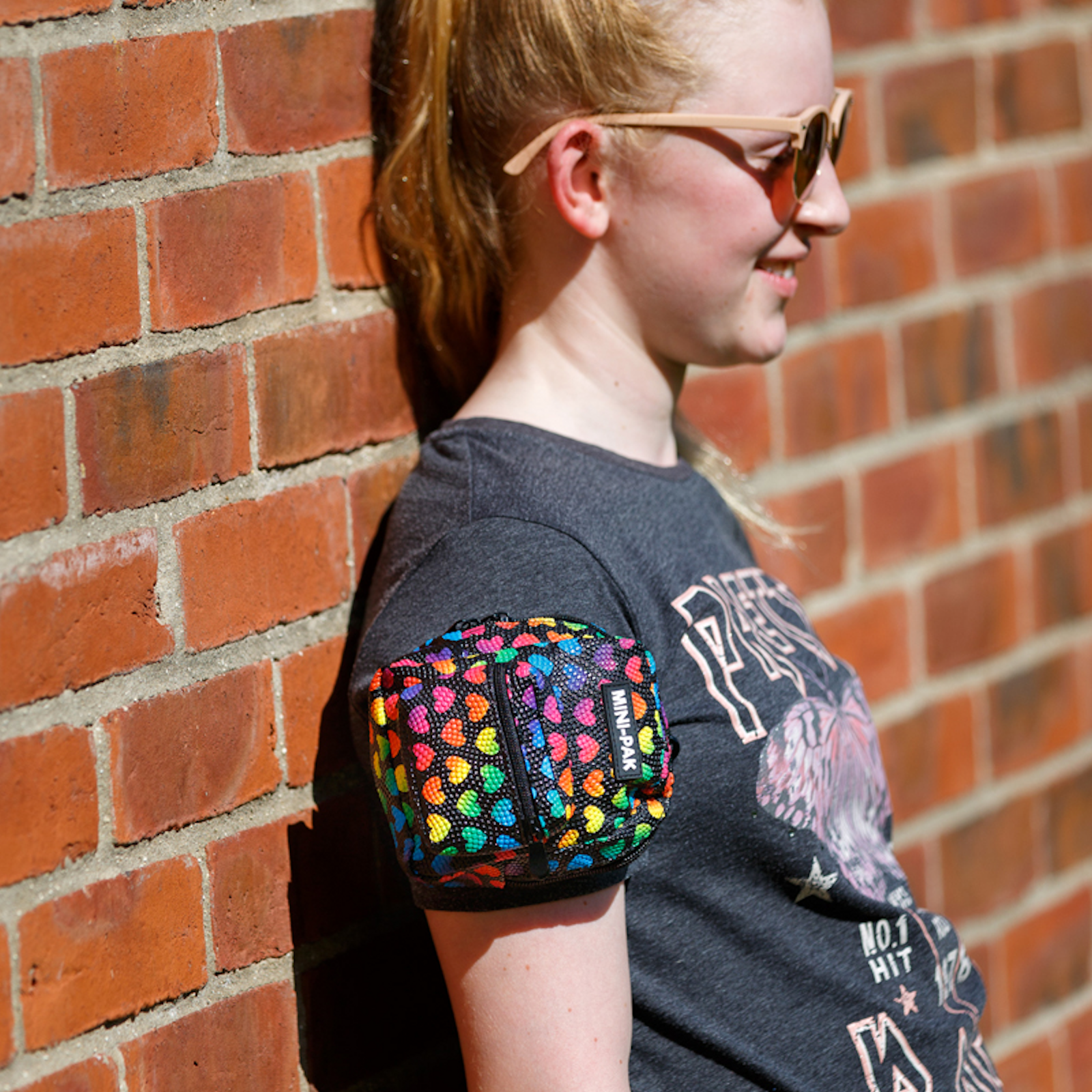 The MINI-PAK arm bags are the unique and clever way to store all your essential accessories on your arm.