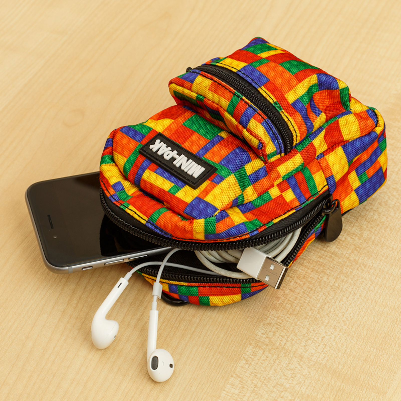 The MINI-PAK arm bags are the unique and clever way to store all your essential accessories on your arm.