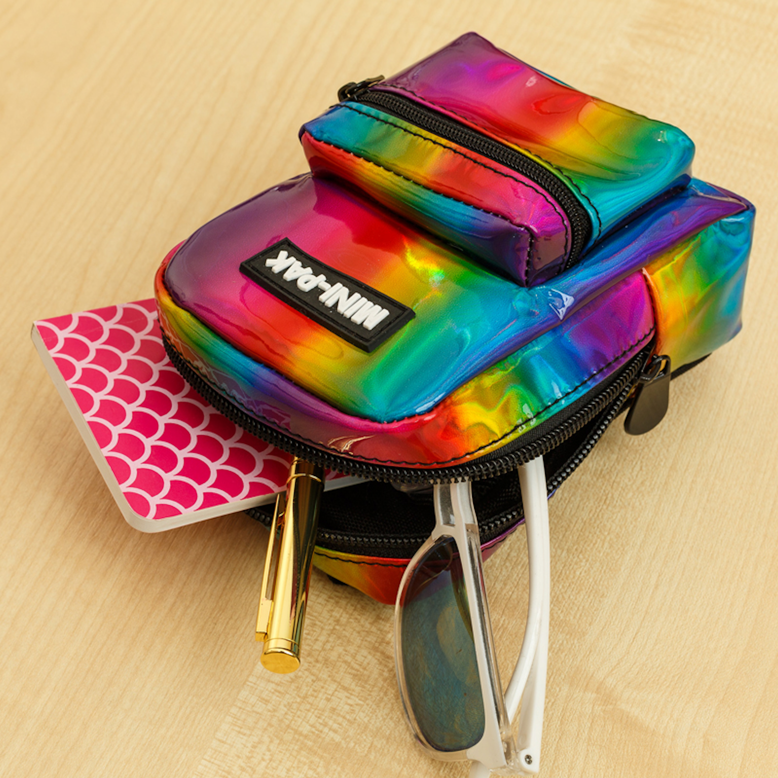 The MINI-PAK arm bags are the unique and clever way to store all your essential accessories on your arm.