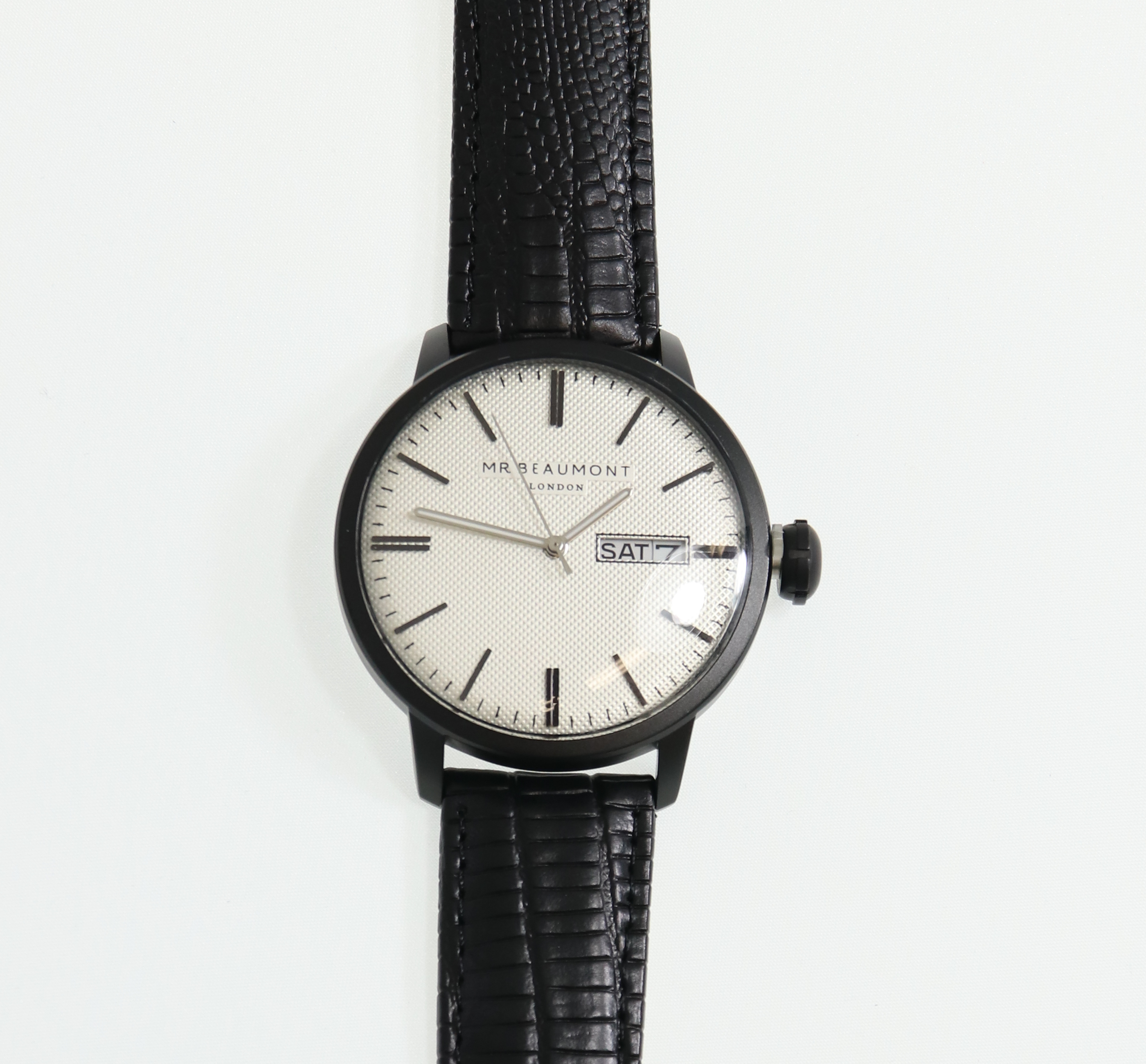 Get your unique signature with a beautifully designed watch, a timeless piece that will compliment any outfit, the Mr Beaumont Mens Watch - Matte Case MB1803.4 is a classic mens watch that consists of a metallic black case, a striking carbonised dial - all complemented by a genuine nappa stamped leather strap, in black. All tastefully presented in Mr Beaumont's trademark gift box and leather watch protector.
