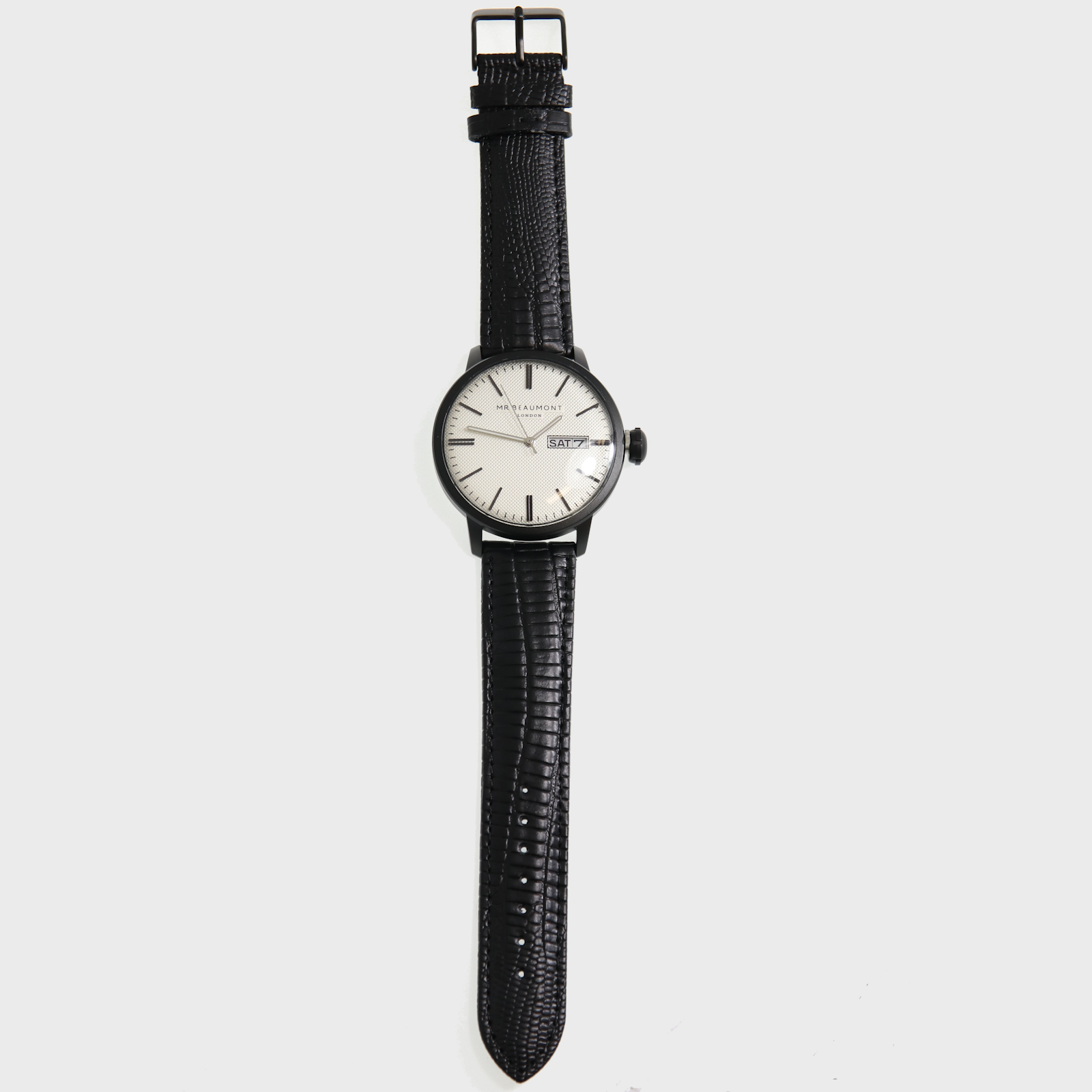 Get your unique signature with a beautifully designed watch, a timeless piece that will compliment any outfit, the Mr Beaumont Mens Watch - Matte Case MB1803.4 is a classic mens watch that consists of a metallic black case, a striking carbonised dial - all complemented by a genuine nappa stamped leather strap, in black. All tastefully presented in Mr Beaumont's trademark gift box and leather watch protector.