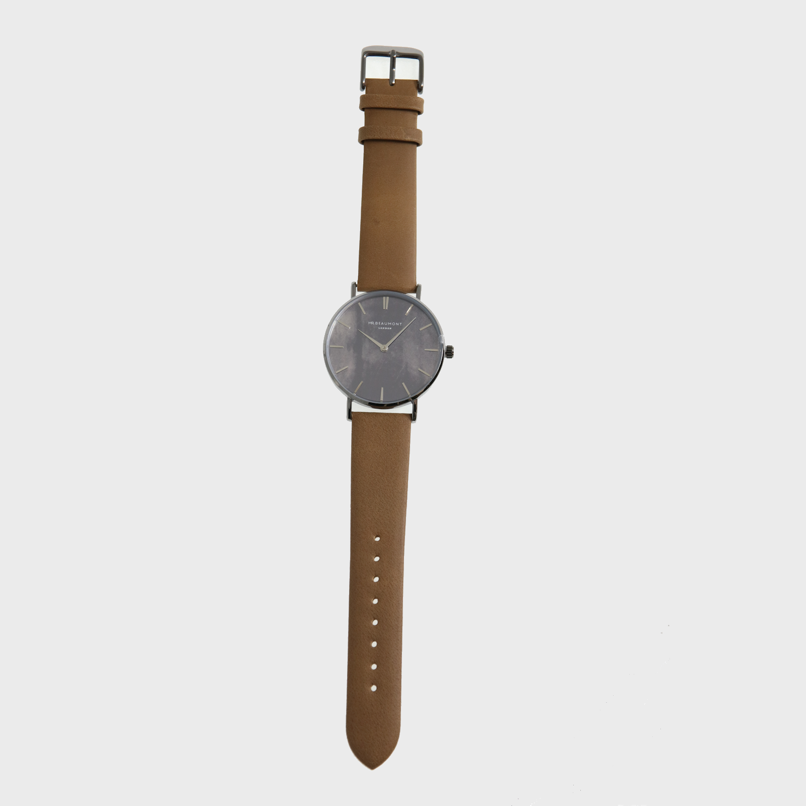 Have a better track of time and improve your look with Mr Beaumont Mens Watch – Carbonised MB1805.1, this classic mens watch consists of a metallic silver case, a striking carbonised dial and silver details - all complemented by a genuine nappa leather strap in a beautiful tan colour