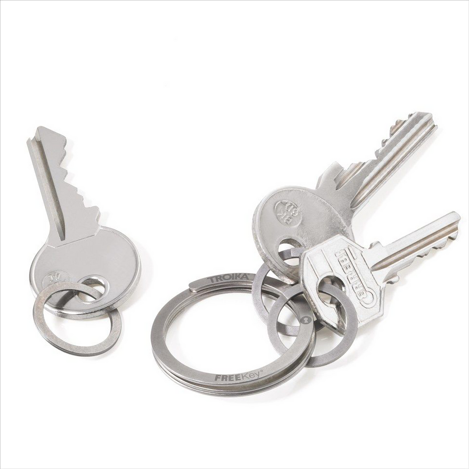 Free yourself from the awkward and outdated design of regular key-rings and invest in the Troika Free Key