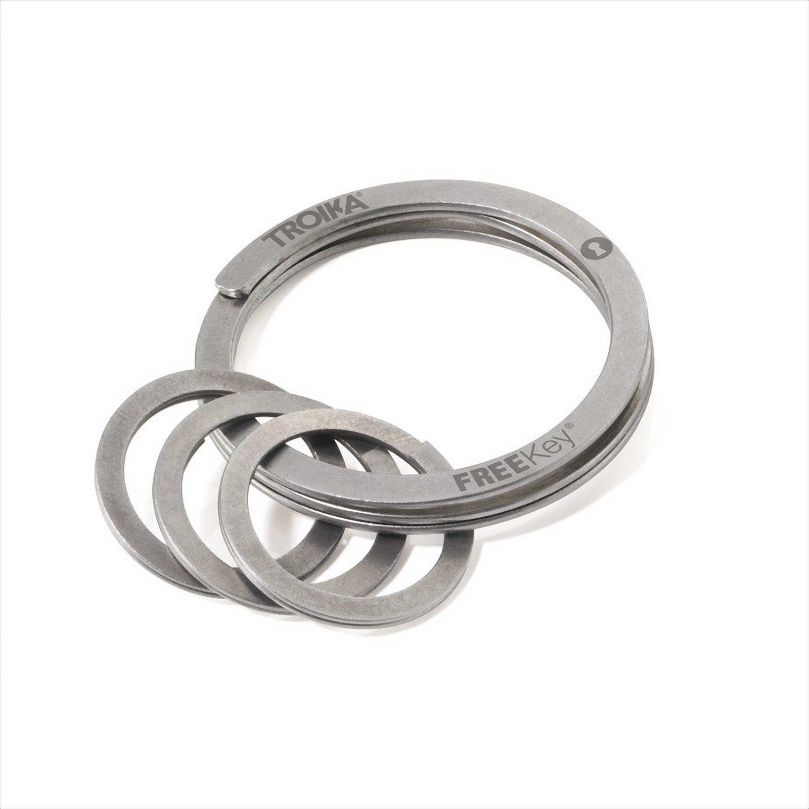 Free yourself from the awkward and outdated design of regular key-rings and invest in the Troika Free Key